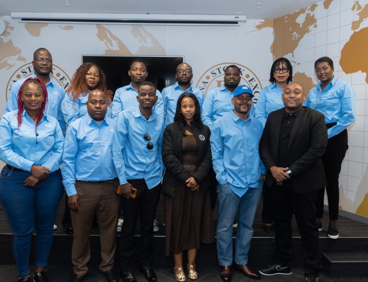 The visiting journalists poses with BSE officials in Gaberone