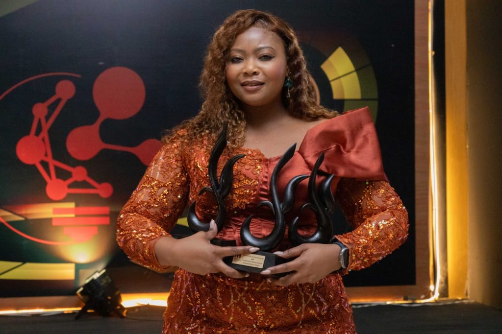 Akossa-Mphepo-Hiwa-poses-with-the-awards