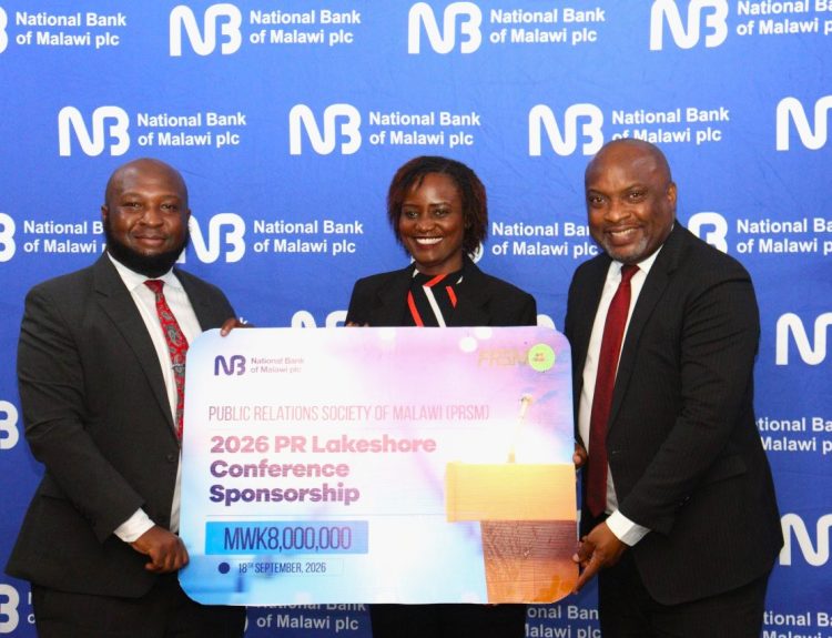 Chapeyama Left presenting a dummy cheque to Mhango and PRSM Treasurer General Wadza Otomani 002