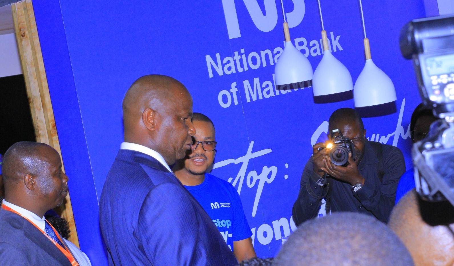 Chapo left engaging with NBM representatives during the Maputo International Trade Fair 002