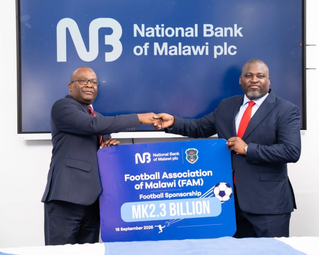NBM plc hikes football sponsorship to K2.3 billion 2 KatsalaLeft handing the dummy cheque to Haiya 002