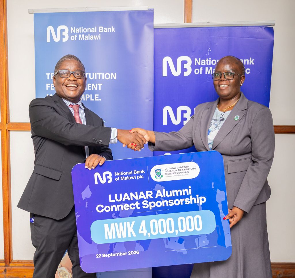 NBM plc backs LUANAR Alumni Network with K4 million sponsorship 2 Malenga Left handing over symbolic cheque to Mwangwela 002
