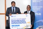Malenga right hands over a dummy cheque to Nanthuru 002 1