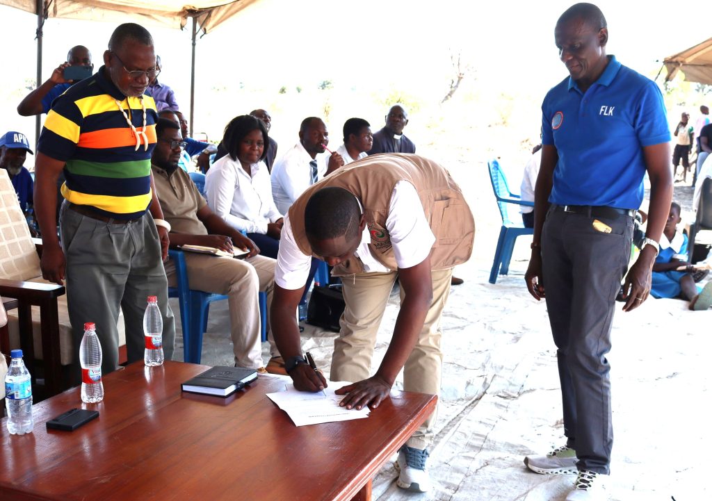MAGLA acquires land for Cyclone Freddy-damaged Mpatsa School in Nsanje 3 MpulukaCentre signing off the land deal alongside senior TA Tengani Left and Kasaila Right 002