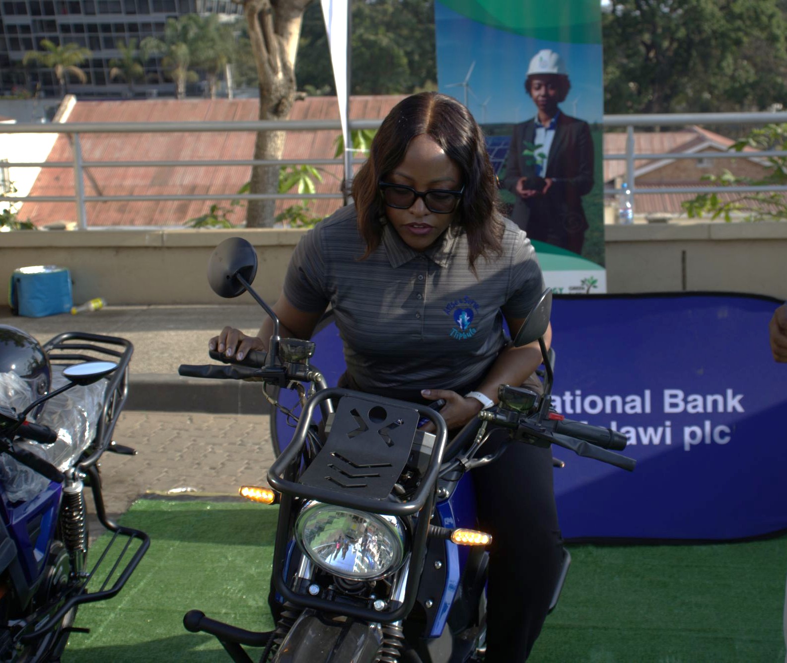 NBM plc Relationship Manager Rachel Chirambo testing the e bike 002