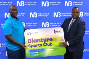 NBM plc injects K60 million into Blantyre Sports Club projects 2 Masi Right handing over the symbolic cheque to Nkhata 002 scaled